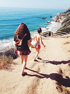 Brooke Freundlich walking to the beach