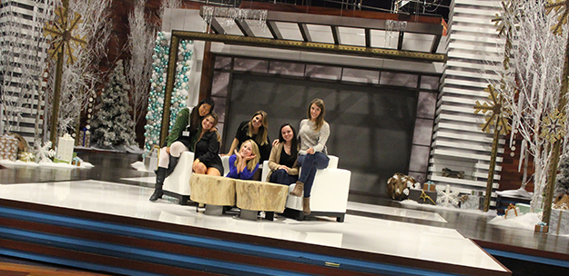 Mia Kuhn on Ellen Show set sitting with group
